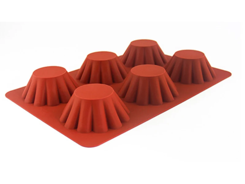 Terracotta-colored silicone baking mold with six shaped cavities